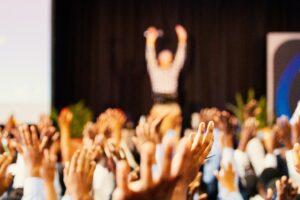 Crowd Hands Raised at an Event